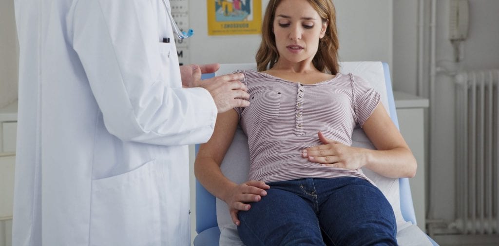 CONSULTATION, WOMAN IN PAIN
